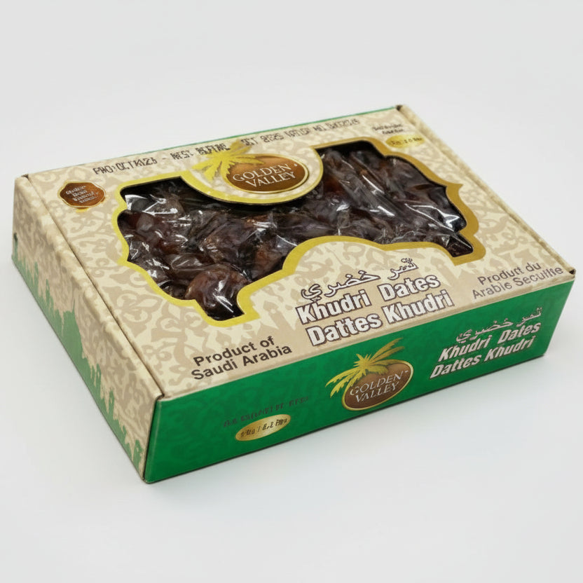 Box of Khudri Dates with green and beige design on a white background