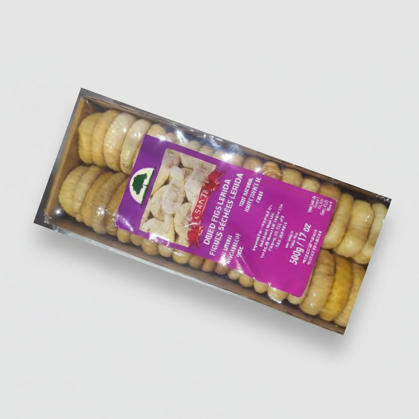 Packaged dried figs with a purple label on a white background